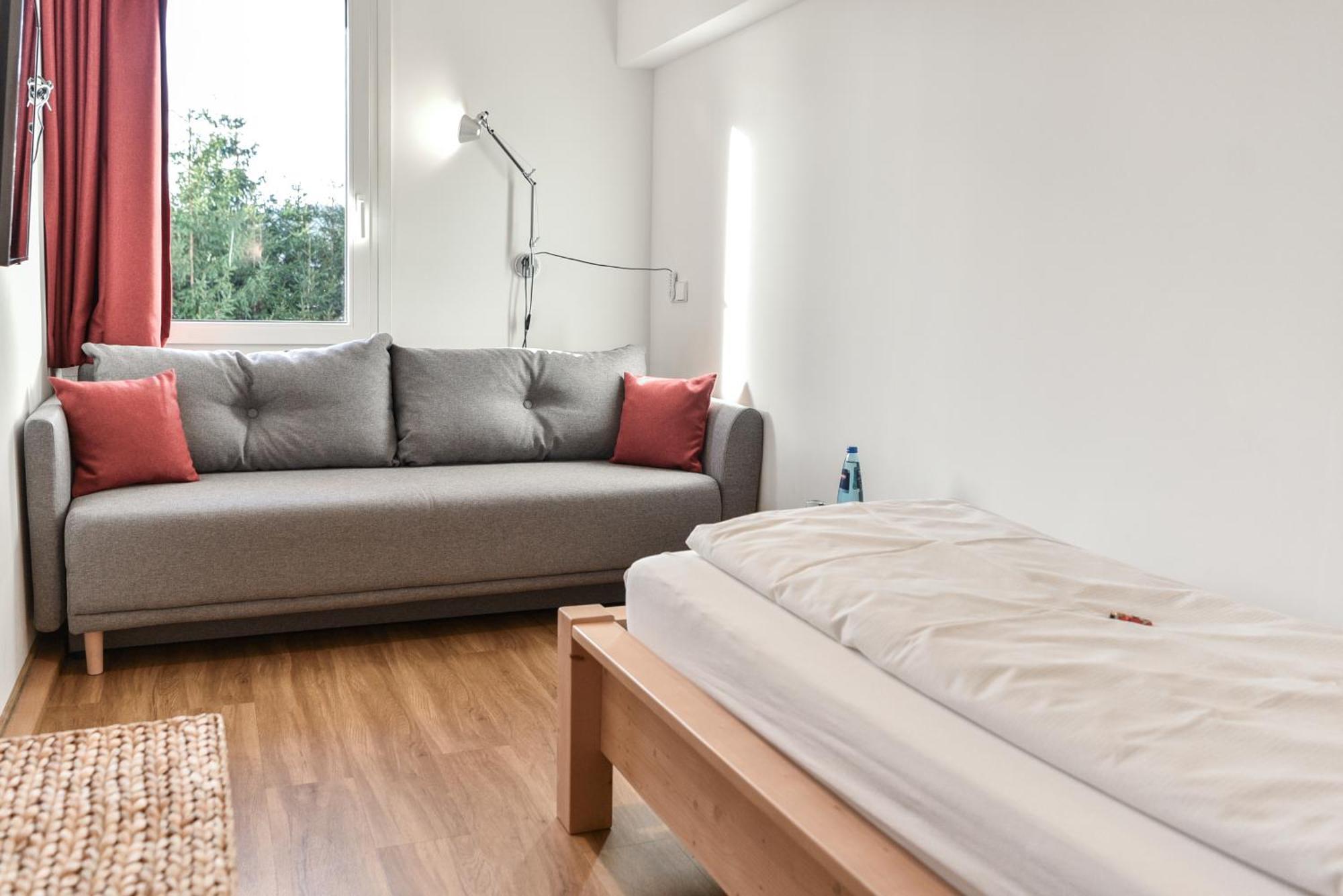 Doppel- oder Zweibettzimmer